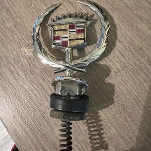 2 Cadillac hood emblems $60 per item obo